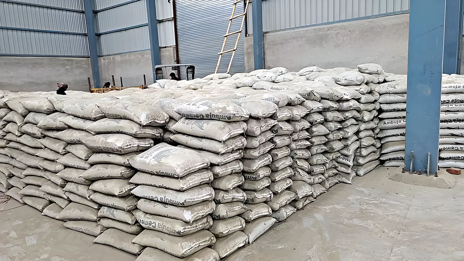 Cement bags stacked in the covered warehouse